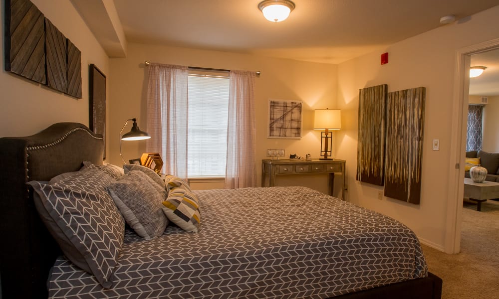 Cozy bedroom at Villas of Waterford Apartments in Wichita, Kansas