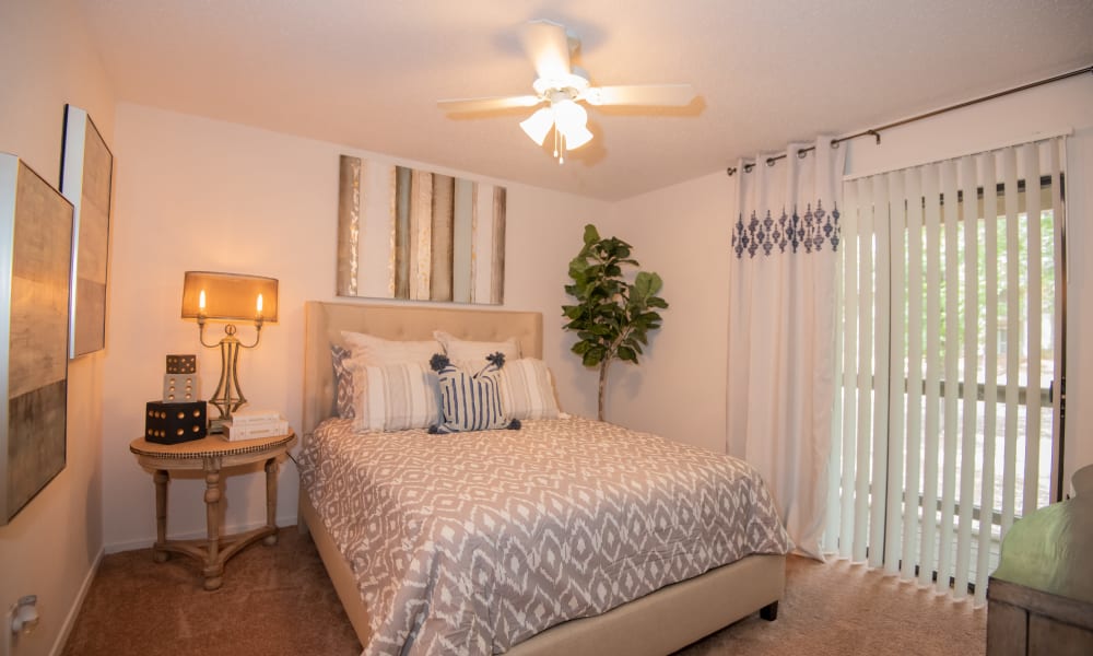 An apartment bedroom at The Trace of Ridgeland in Ridgeland, MS