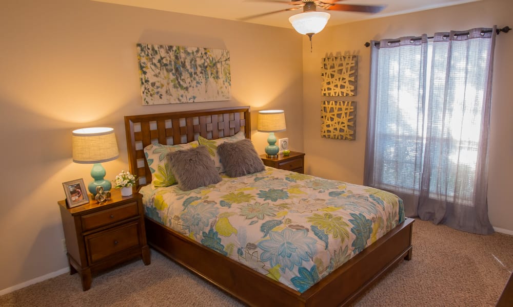 An apartment bedroom at Barcelona Apartments in Tulsa, OK
