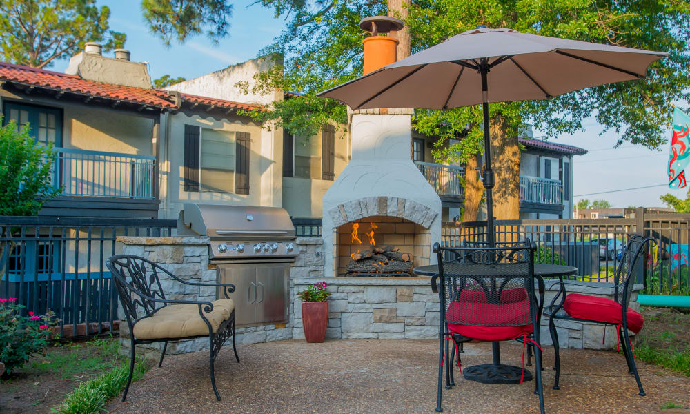 An outdoor fireplace at Barcelona Apartments in Tulsa, OK