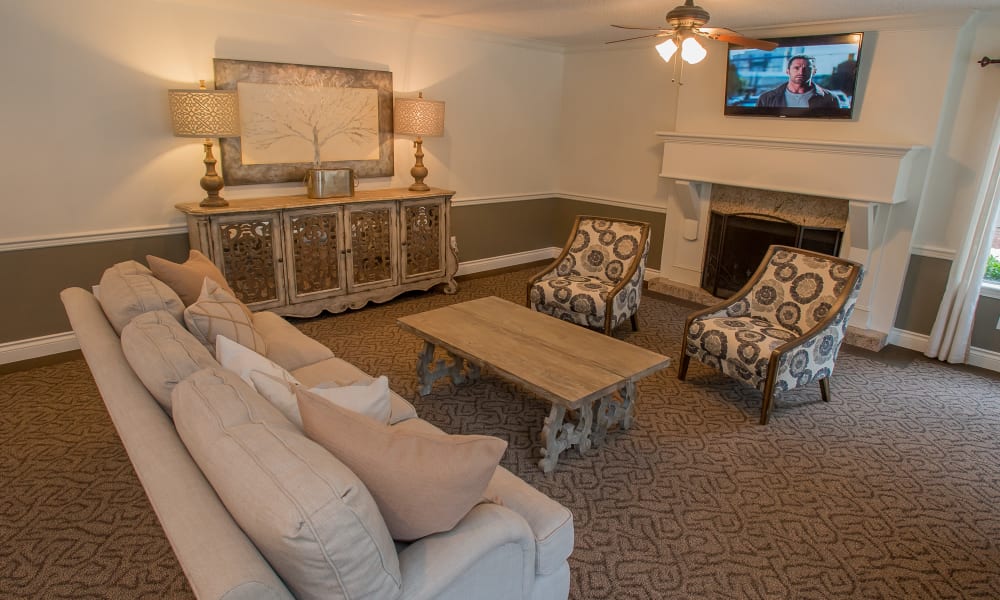 A large couch and seating area in the clubhouse at Cimarron Pointe Apartments in Oklahoma City, OK