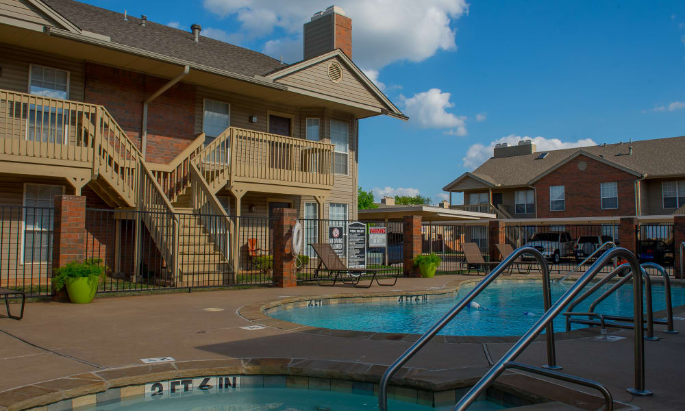 The community pool at Persimmon Square Apartments in Oklahoma City, OK