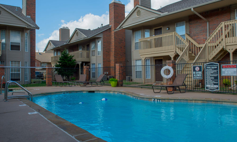 A large pool at Persimmon Square Apartments in Oklahoma City, OK