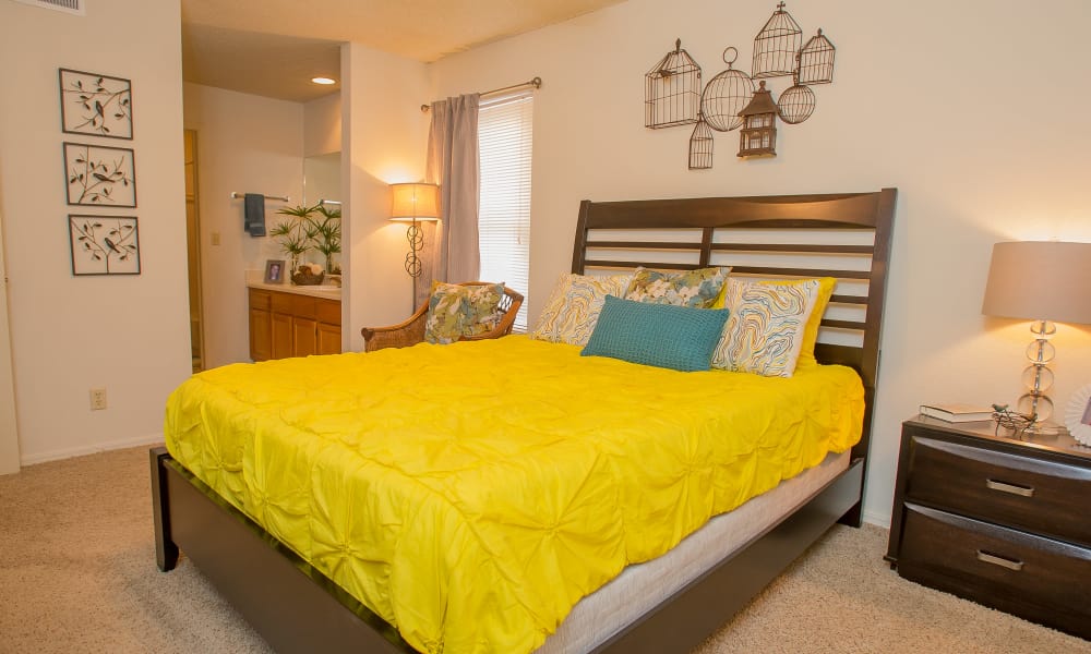 Cozy bedroom at Polo Run Apartments in Tulsa, Oklahoma