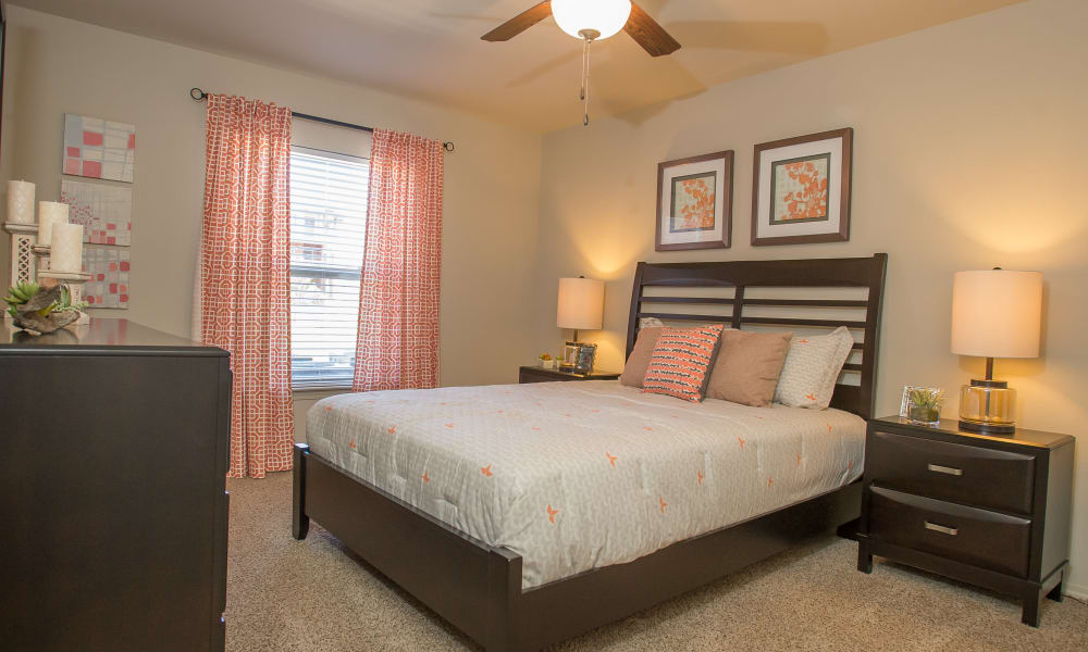 Bedroom with a ceiling fan at The Reserve at Elm in Jenks, Oklahoma