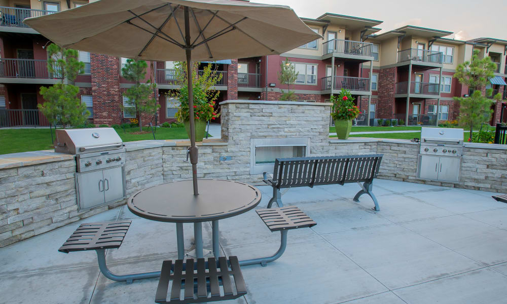Outdoor patio with a grill at The Reserve at Elm in Jenks, Oklahoma
