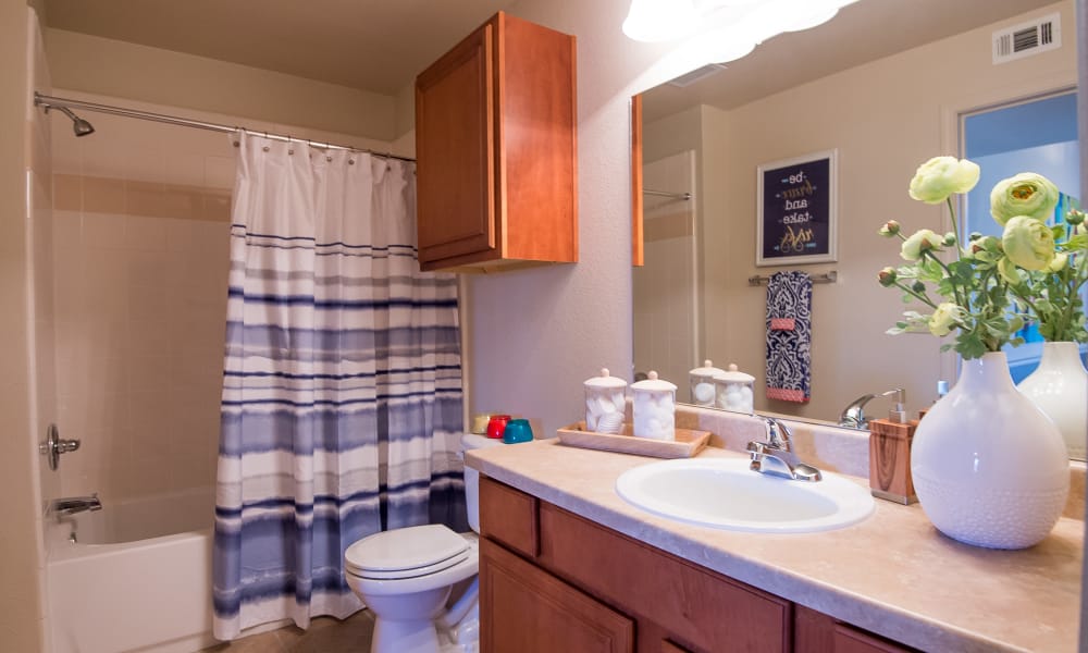An apartment bathroom at Villas at Aspen Park in Broken Arrow, Oklahoma
