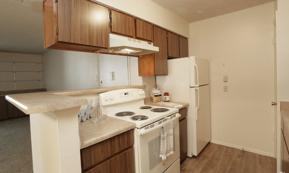 An open apartment kitchen at High Ridge Apartments in El Paso, Texas
