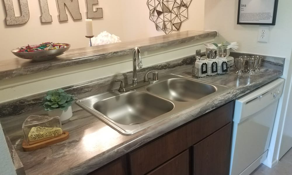 An apartment kitchen sink at The Chimneys Apartments in El Paso, Texas
