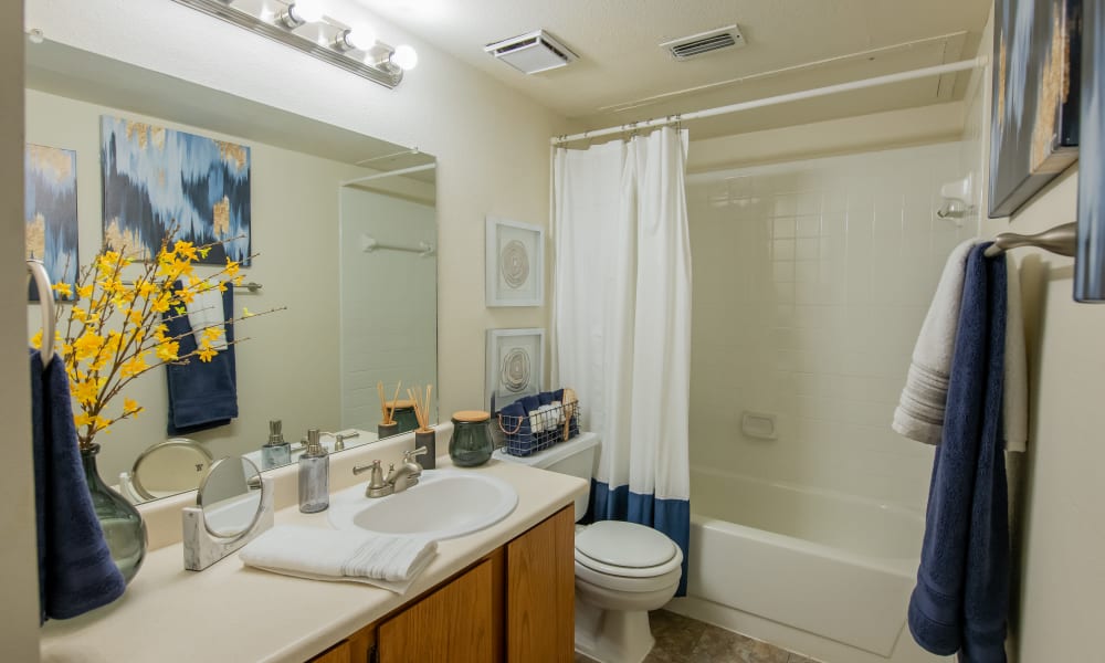 An apartment bathroom at Newport Apartments in Amarillo, Texas