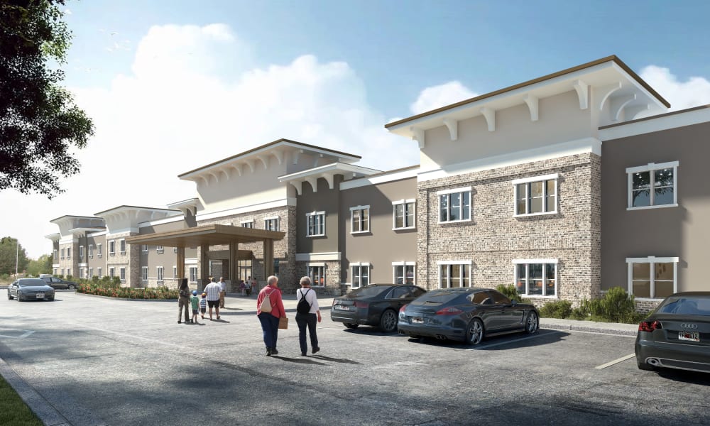 Front entrance and parking lot for The Mansions at Sandy Springs Assisted Living and Memory Care in Peachtree Corners, Georgia