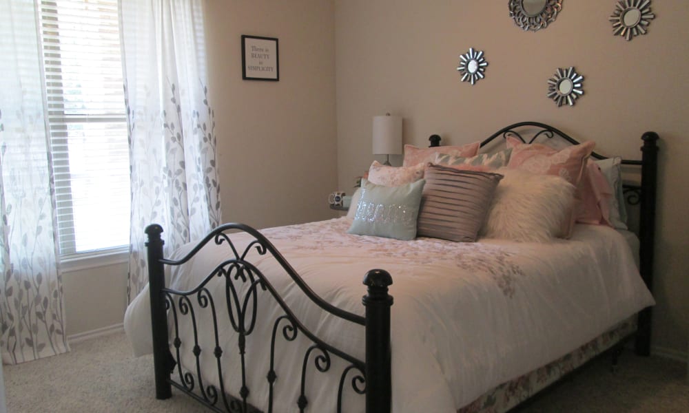 Bedroom at Stone Lake Apartments in Grand Prairie, Texas
