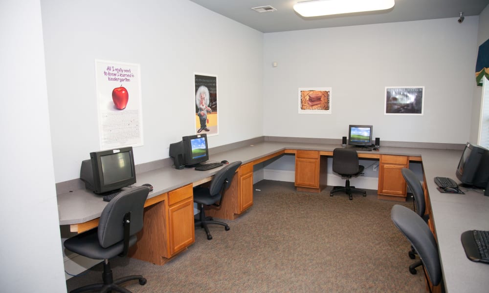 A business center with individual computers for resident use at Peine Lakes in Wentzville, Missouri