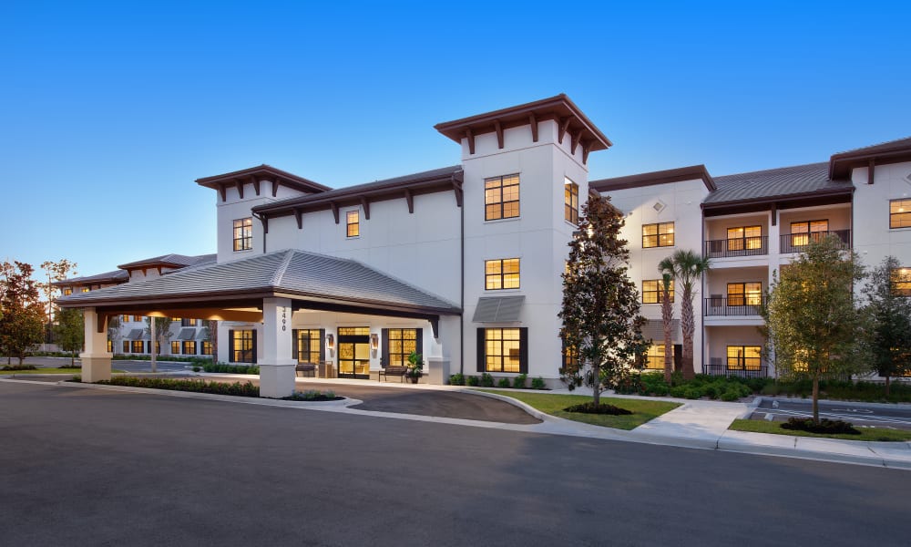 Exterior of Keystone Place at Naples Preserve at dusk in Naples, Florida