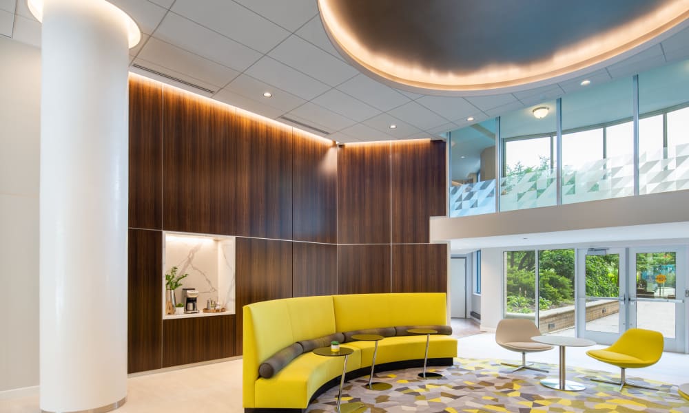 The lobby at Alexander House offers residents a library and lounge area in Silver Spring, Maryland