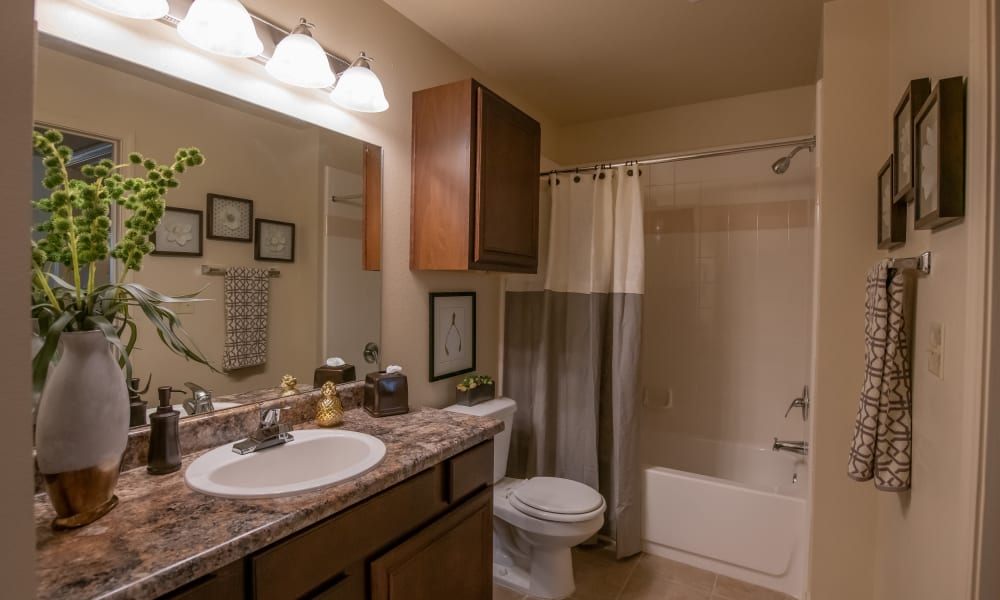 An apartment bathroom at Park at Mission Hills in Broken Arrow, Oklahoma