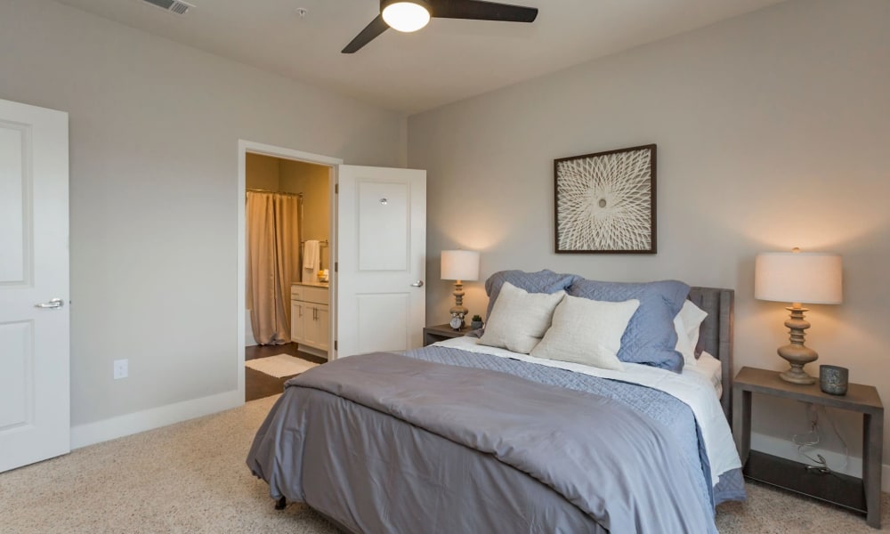 Large master bedroom in a model home at Rivertop Apartments in Nashville, Tennessee