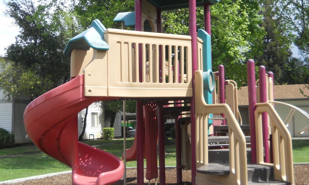 A playground that is great for entertaining at River Court Apartments in Sacramento, CA