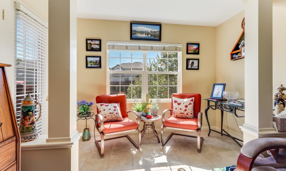 Relaxing nook with large windows at Keystone Place at Legacy Ridge in Westminster, Colorado. 