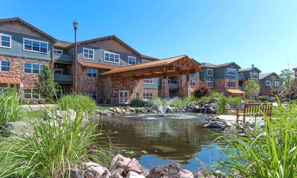 Front entrance and pond at Keystone Place at Legacy Ridge in Westminster, Colorado. 