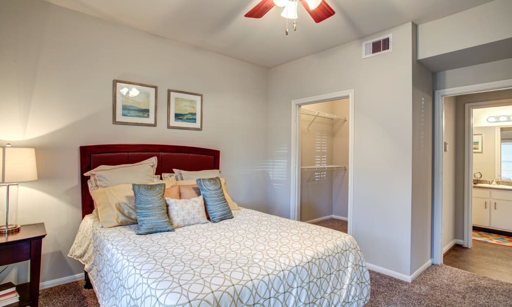 A spacious apartment bedroom at Regatta Bay in Seabrook, Texas