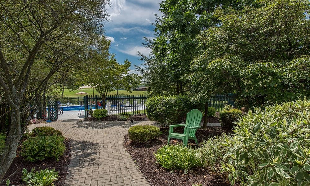 Path to the swimming pool at Steeplechase Apartments in Camillus, New York