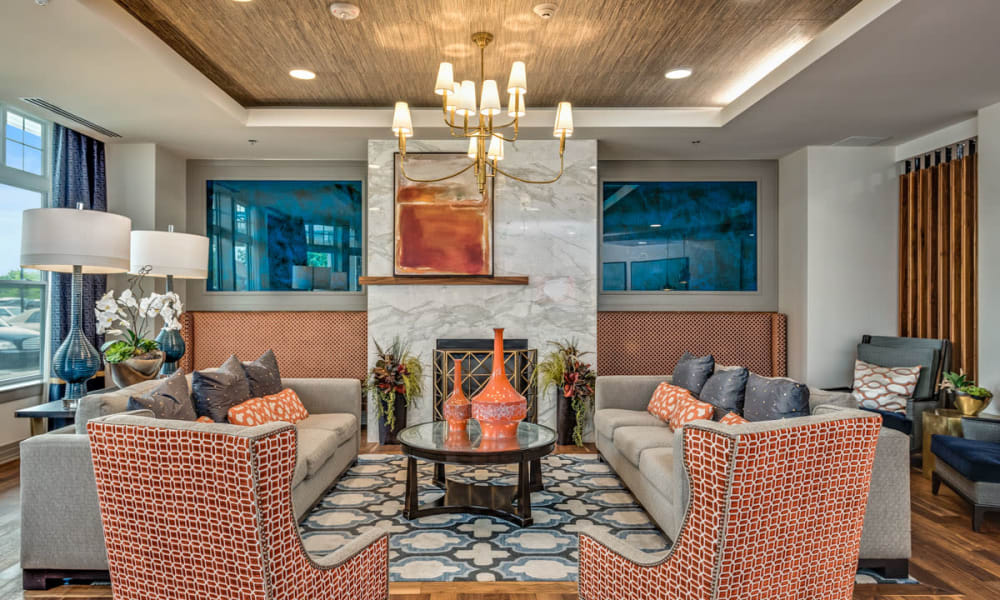 Comfy lounge area with couches at Anthology of Clayton View in Saint Louis, Missouri