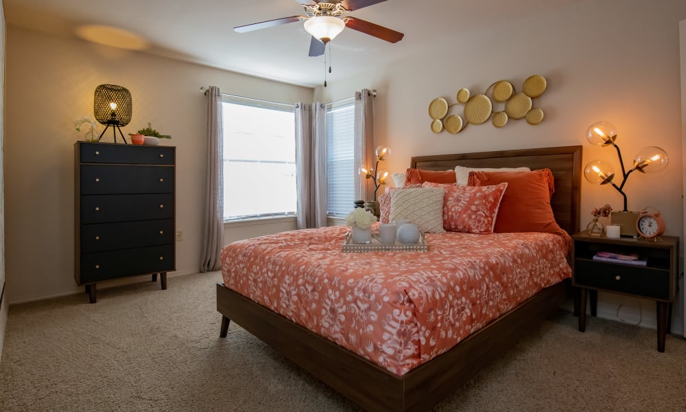 An apartment bedroom at Nickel Creek Apartments in Tulsa, Oklahoma