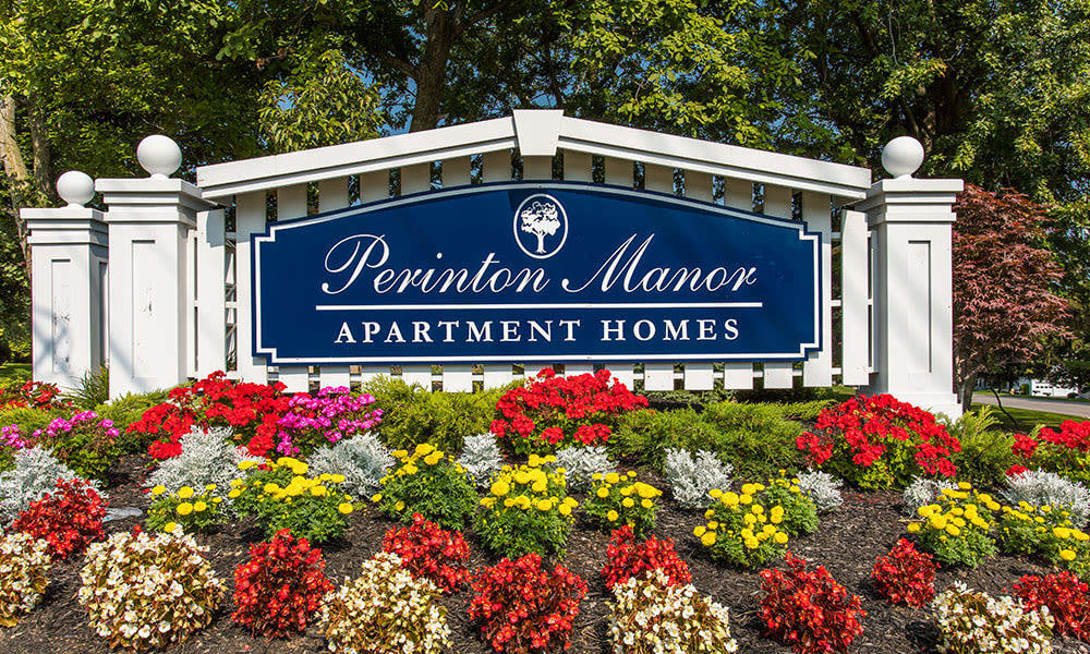 Sign to Perinton Manor Apartments in Fairport, New York