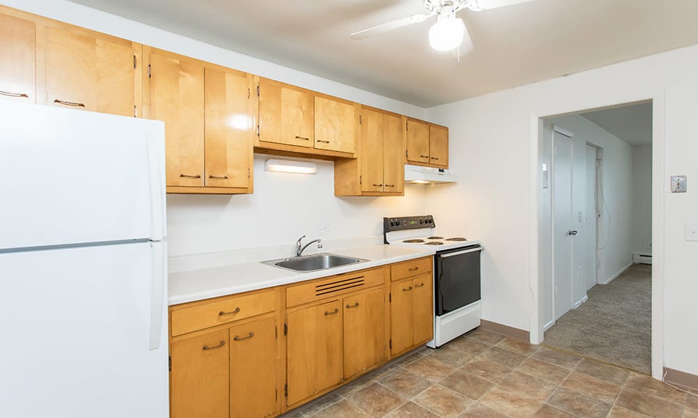 Kitchen area at Pittsford Garden Apartments in Pittsford, New York