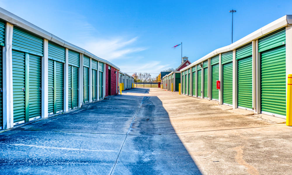 Driveway through storage units at Devon Self Storage in Greenville, Texas