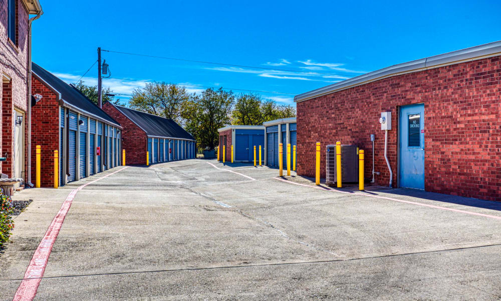 Driveway through storage units at Devon Self Storage in Sherman, Texas