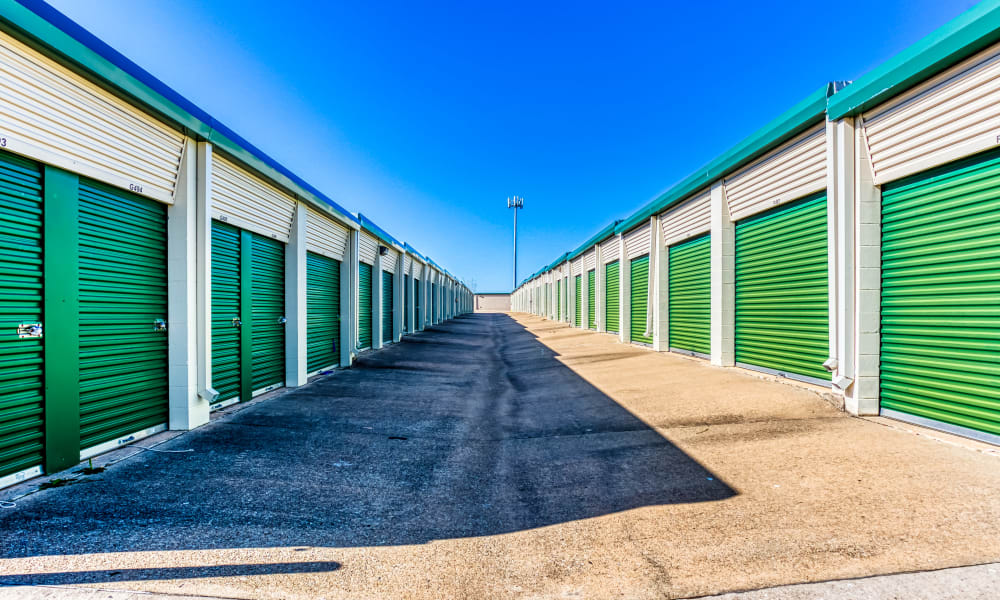 Driveway through storage units at Devon Self Storage in Sherman, Texas