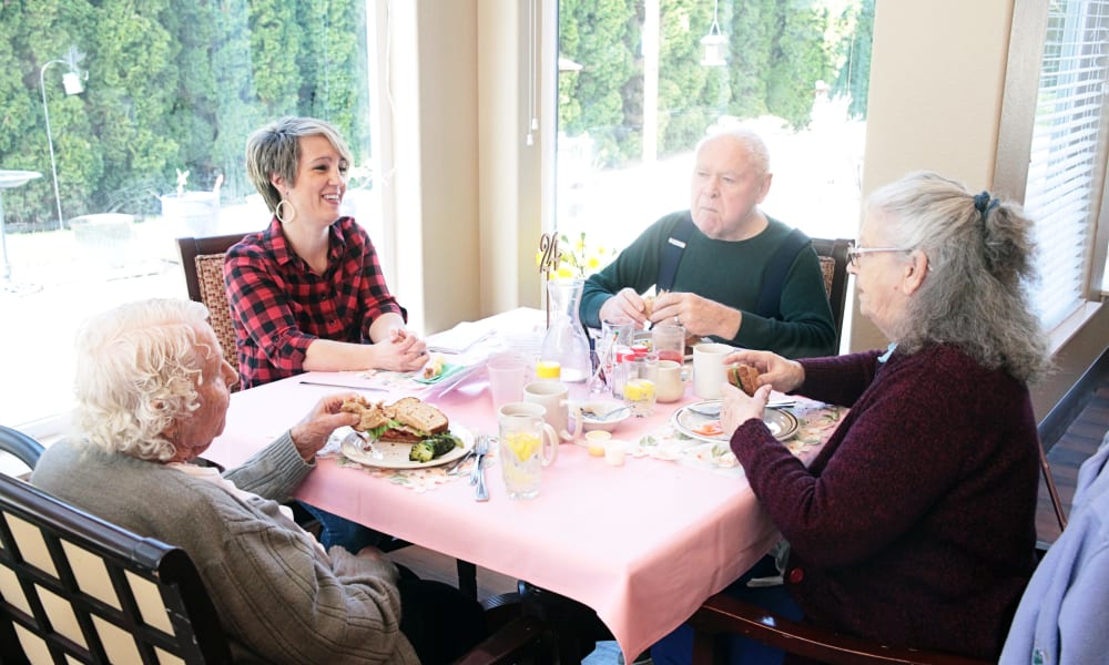 Residents enjoying meal at Heron Pointe Senior Living in Monmouth, Oregon