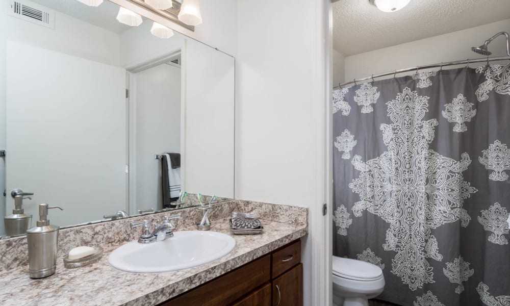 An apartment bathroom at Paddock Club Apartments in Florence, Kentucky