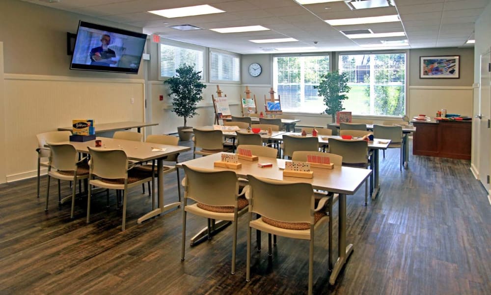 A game room with a television at Anthology of Wheaton in Wheaton, Illinois