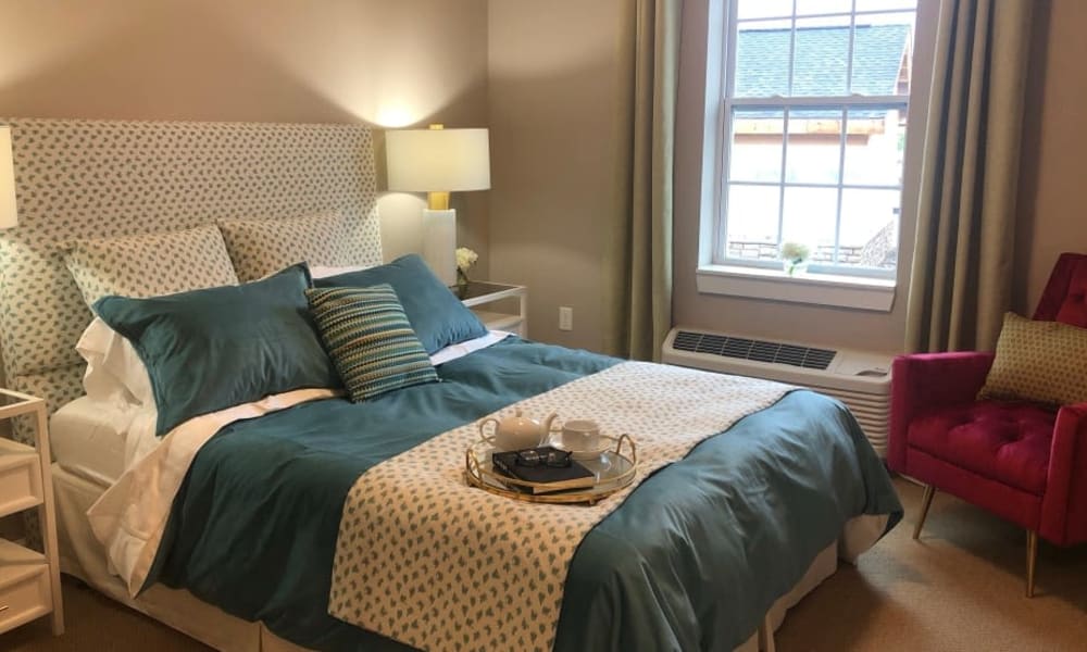 Senior living apartment bedroom at Randall Residence of Auburn Hills in Auburn Hills, Michigan