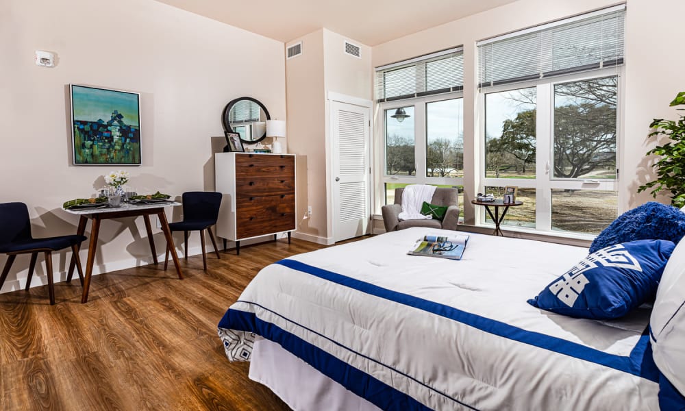 Large resident bedroom at Merrill Gardens at Columbia in Columbia, South Carolina. 