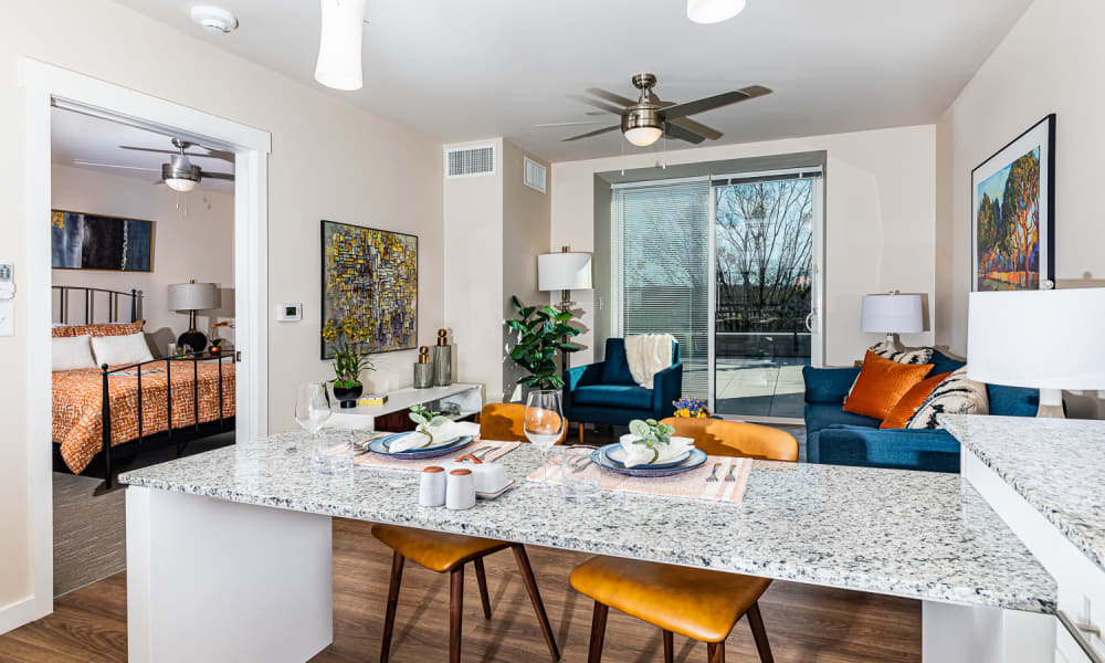 Resident apartment with hardwood flooring at Merrill Gardens at Columbia in Columbia, South Carolina.