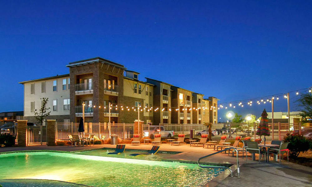 View of the pool area at dusk at Anatole on Briarwood in Midland, Texas