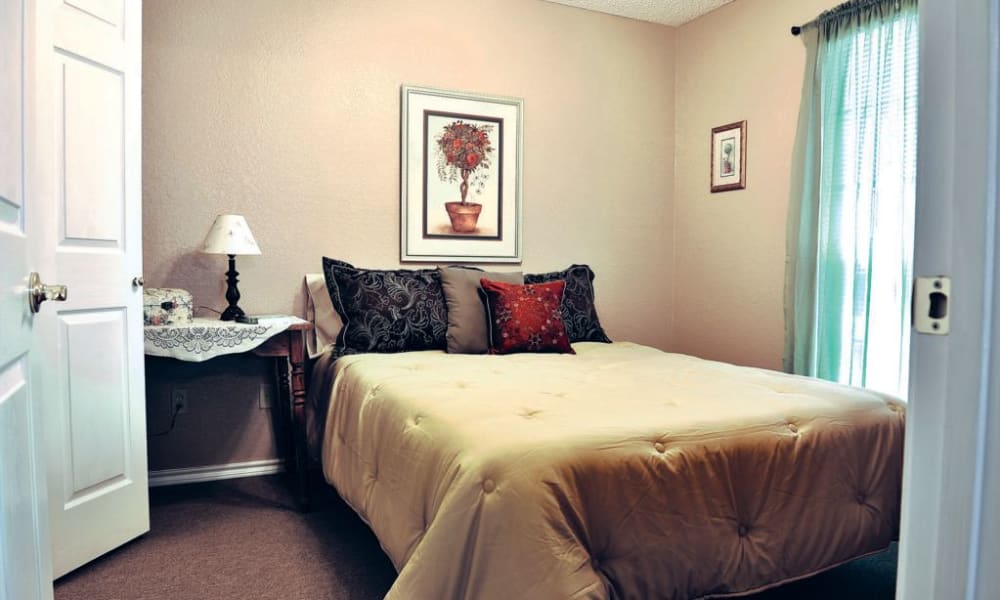 Senior apartment bedroom at Quail Park of Granbury in Granbury, Texas