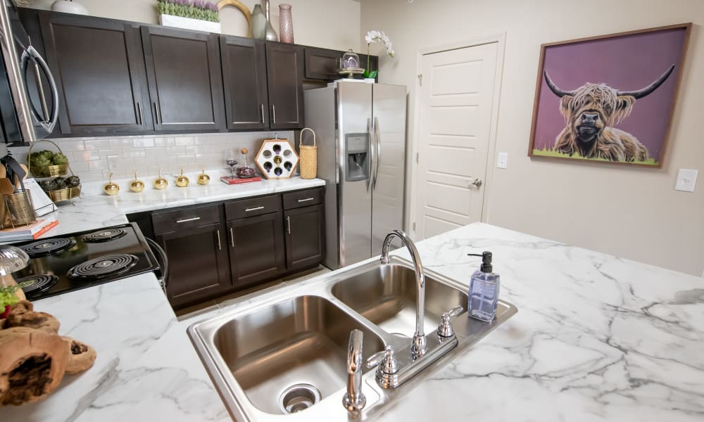 Kitchen with plenty of cabinet space at Cedar Ridge in Tulsa, Oklahoma