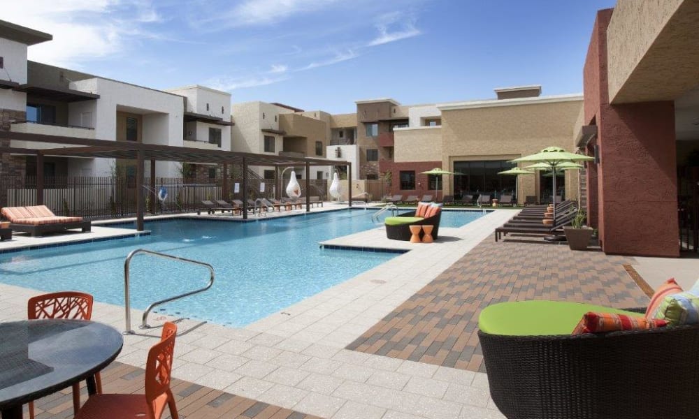 Resort-style swimming pool on a beautiful day at Vive in Chandler, Arizona