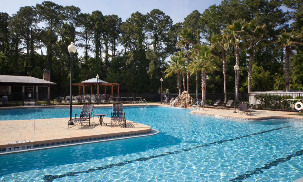 Resort-style swimming pool with underwater lap lanes at Wimberly at Deerwood in Jacksonville, Florida