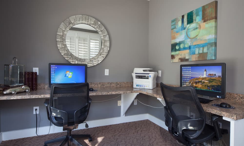 Business center with workstations for resident use at Wimberly at Deerwood in Jacksonville, Florida