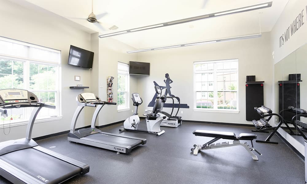 Naturally well-lit fitness center at Torrente Apartment Homes in Upper St Clair, Pennsylvania