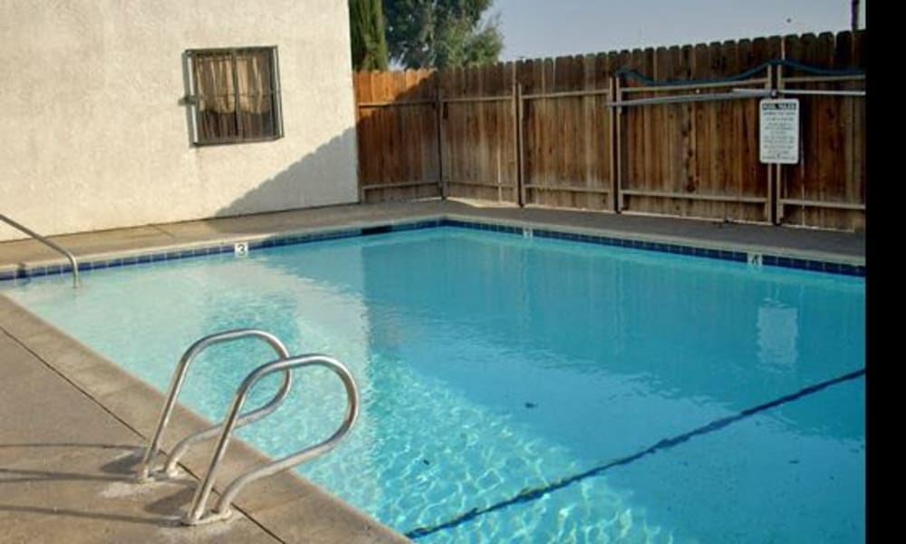 View of the swimming pool at El Potrero Apartments in Bakersfield, California