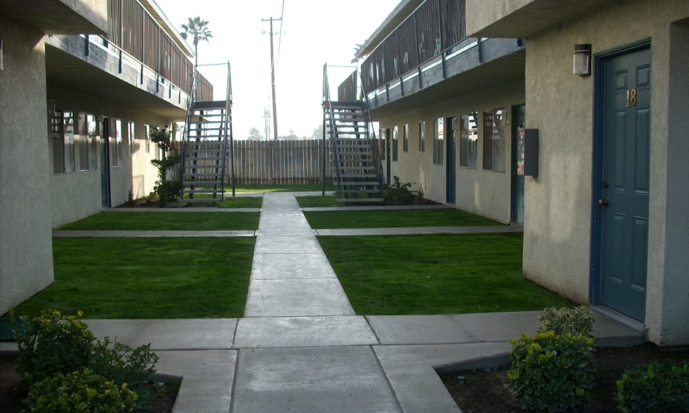 Paths to walk at El Potrero Apartments in Bakersfield, California