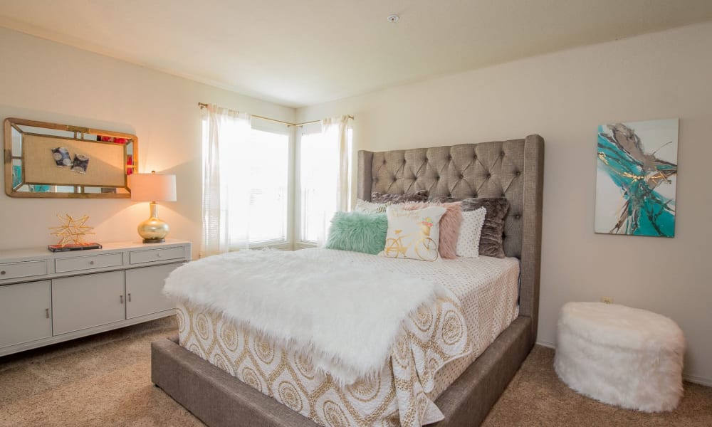 Cozy bedroom at Crown Chase Apartments in Wichita, Kansas