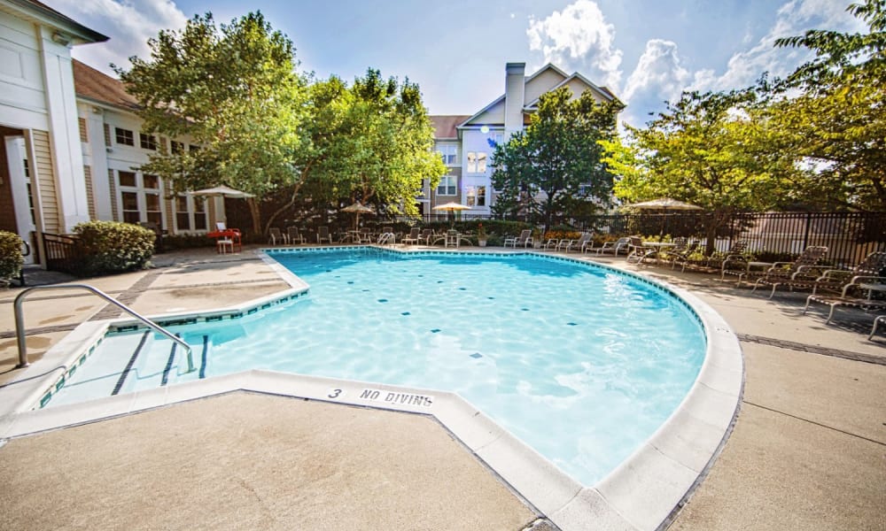 Beautiful day at the swimming pool at Arbor Ridge Apartments in Owings Mills, Maryland